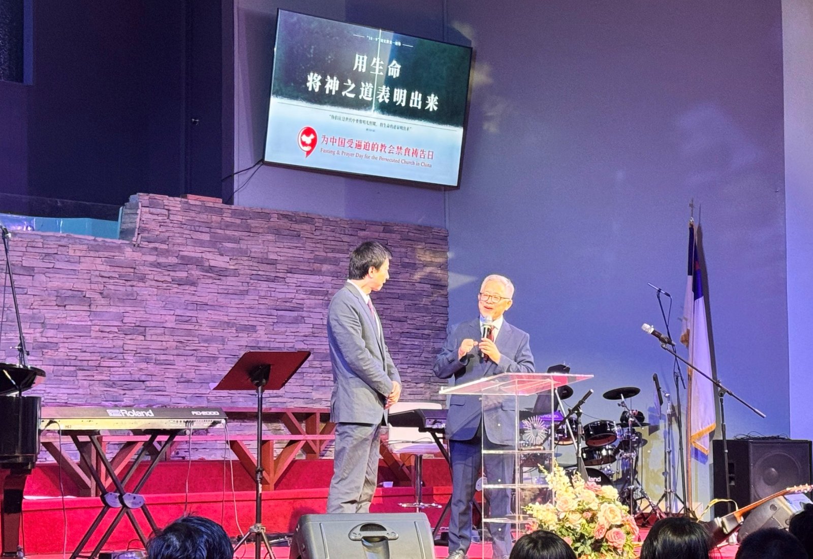 Gao Pu, son of Pastor Gao Quanfu and Pang Yu of the Xi&rsquo;an Church of Light, with Pastor Jin Mingri.