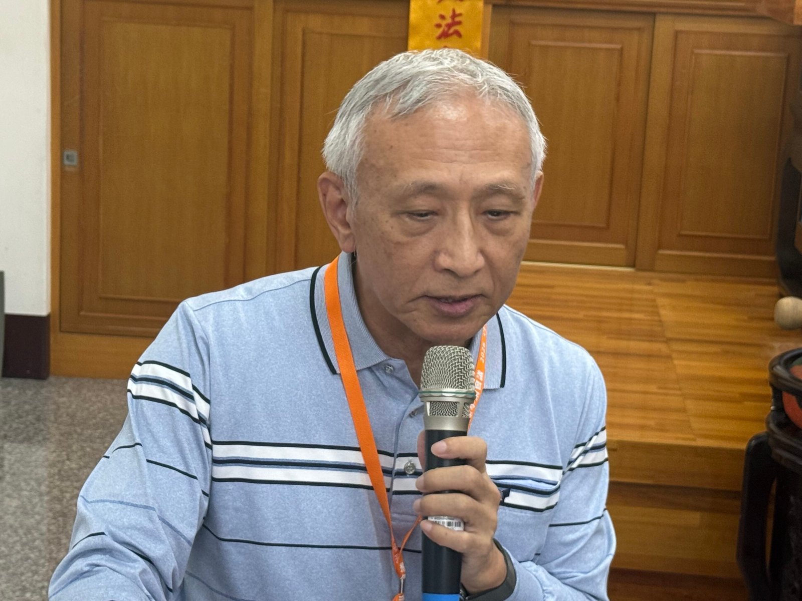 Professor Tsai speaks.