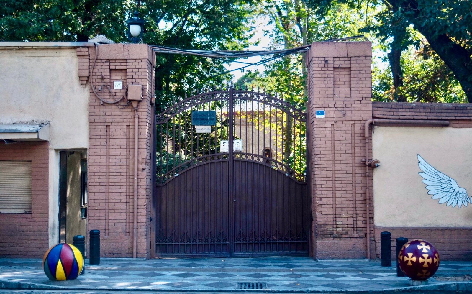 Entrance gate to the church. Credits.